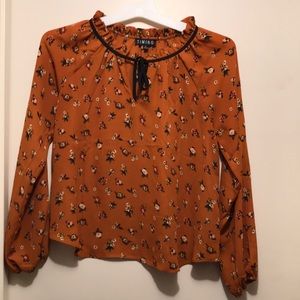 burnt orange floral top